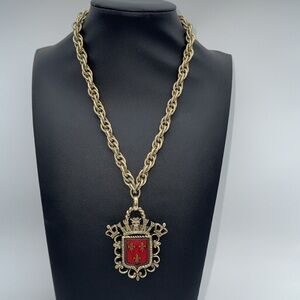 Vintage gold tone family crest fleur de lis royalty large charm pendant necklace